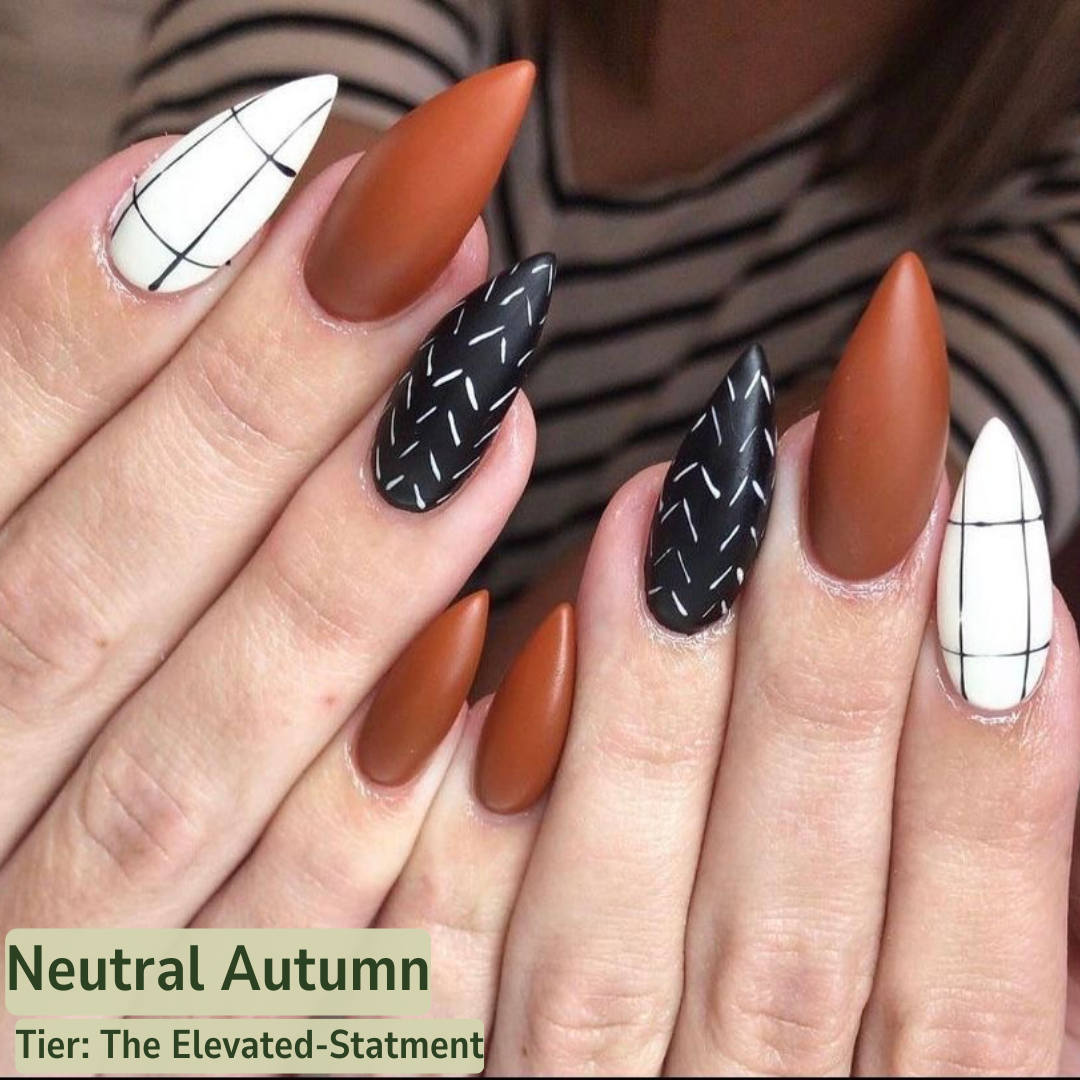 Nails with neutral autumn design on a blurred background